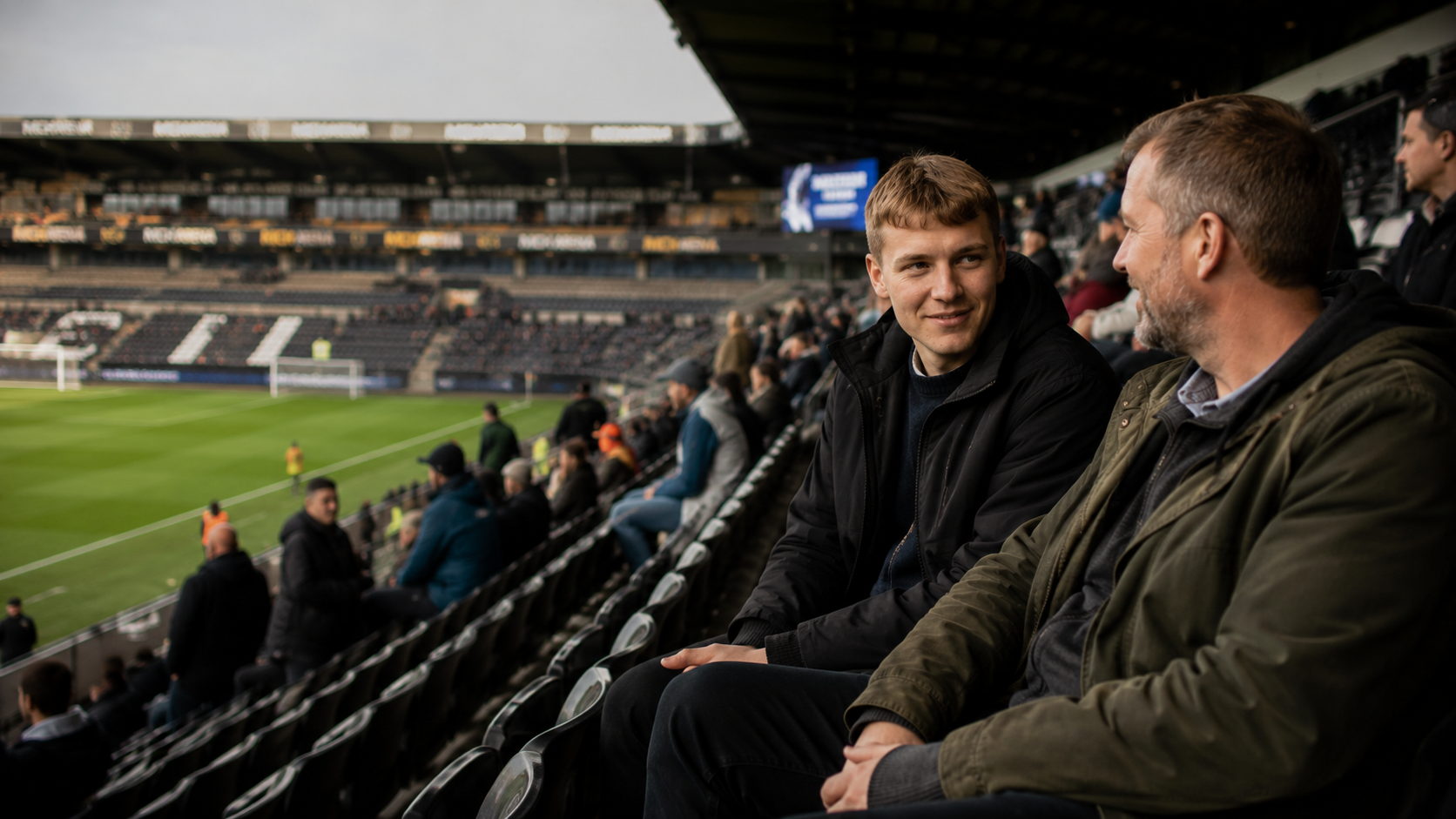 Ledsager og borger til en sportsoplevelse på stadion